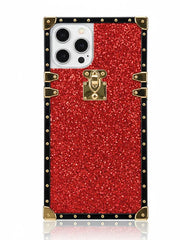 Red glittery phone case with gold accents on a white background
