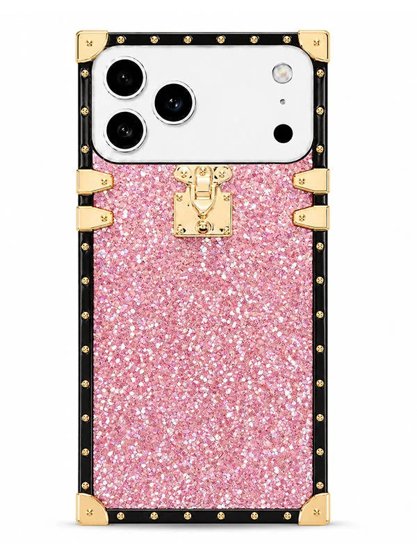 A protective phone case designed for a Google Pixel, featuring a pink glitter center panel with a gold-trimmed lock design and a black outer border with gold studs.