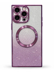 A protective phone case with a purple-to-silver glitter gradient design, featuring a metallic purple MagSafe ring and a matching purple camera bumper, shown on a white background.