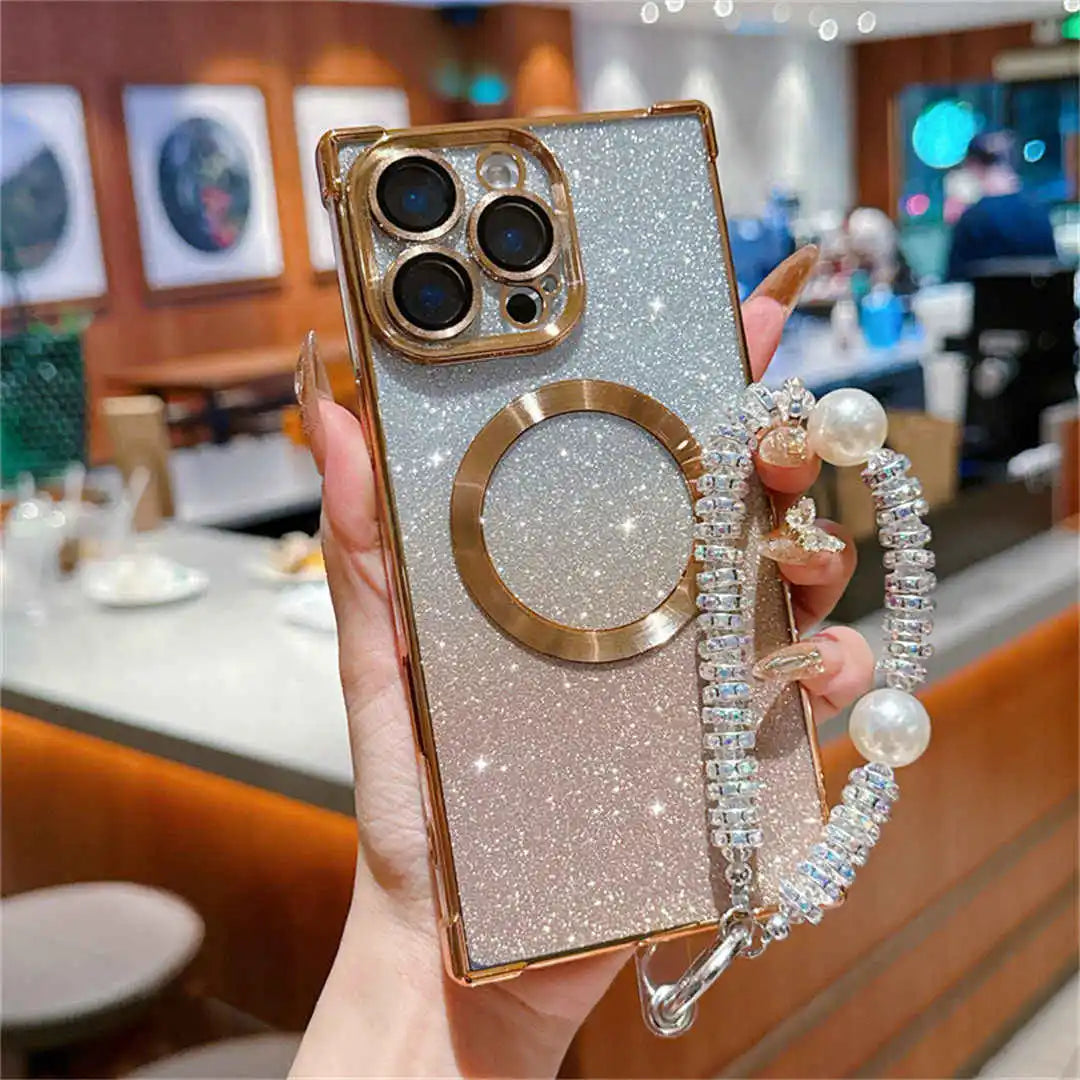 Phone case with ring holder and strap held by a hand in a restaurant setting