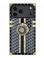 A luxury-style phone case designed for an iPhone 17 Pro, featuring a black and white houndstooth pattern, vertical cream stripes, gold-tone hardware, and a central rose medallion on a white background.