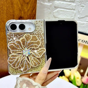 Open iPhone Duo in the gold Crystal Bloom Duo case with a raised rhinestone flower