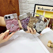 Pink, purple, gold and silver Crystal Bloom Duo rhinestone flower cases held together