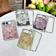 Four Crystal Bloom Duo flower cases displayed in pink, silver, purple and gold with matching front frames