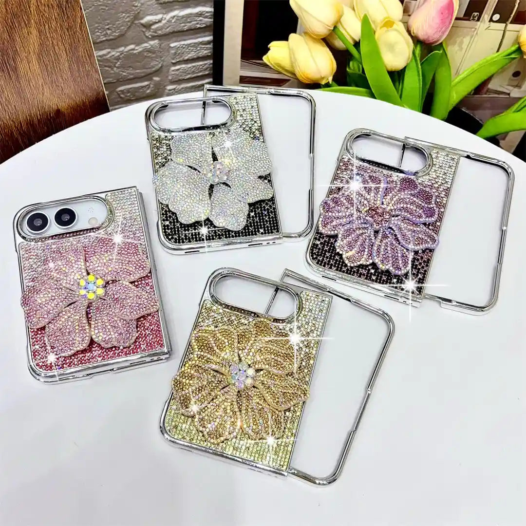 Four Crystal Bloom Duo flower cases displayed in pink, silver, purple and gold with matching front frames