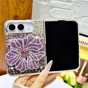 Open iPhone Duo in the purple Crystal Bloom Duo case with a raised rhinestone flower