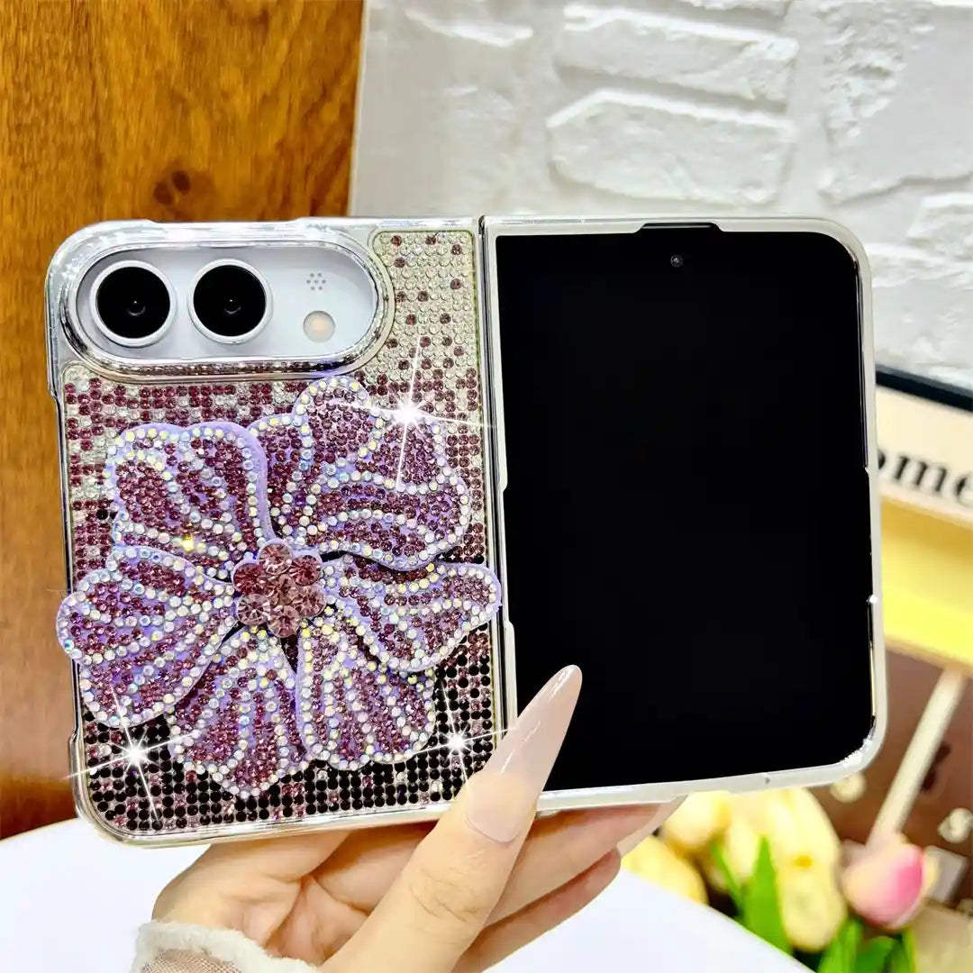 Open iPhone Duo in the purple Crystal Bloom Duo case with a raised rhinestone flower