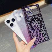 Phone case with leopard print design held by a hand on a light surface