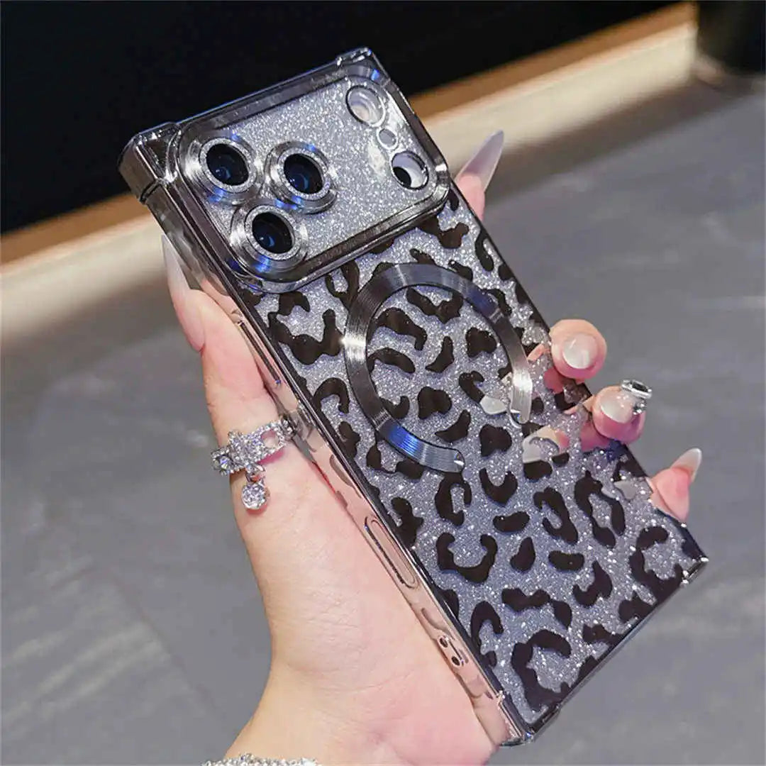 Square phone case with leopard print and glittery accents held by a hand.