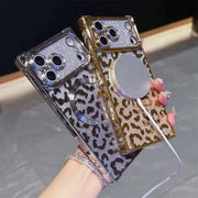 Two decorative phone cases with leopard print and glittery design on a reflective surface.