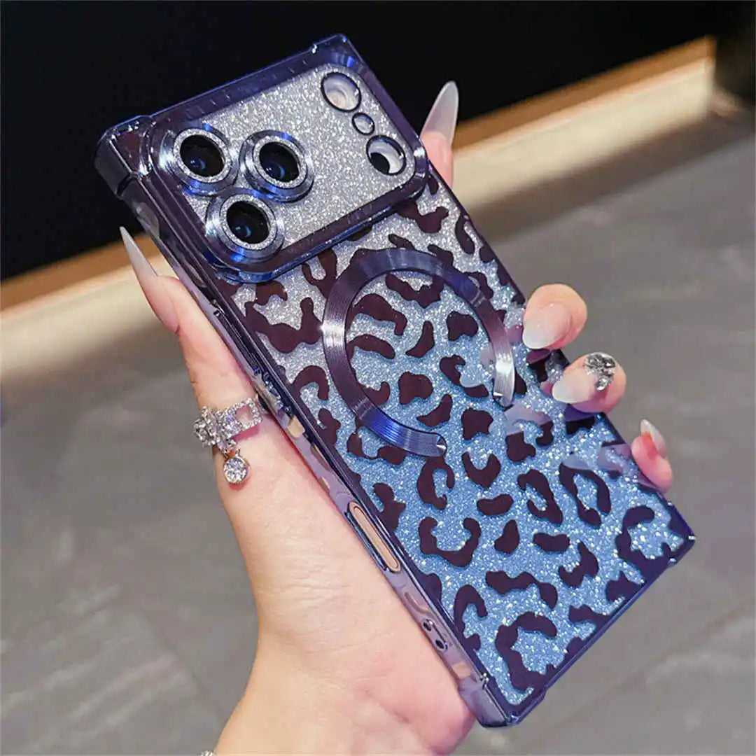 Square phone case with leopard print and blue glittery accents held by a hand.