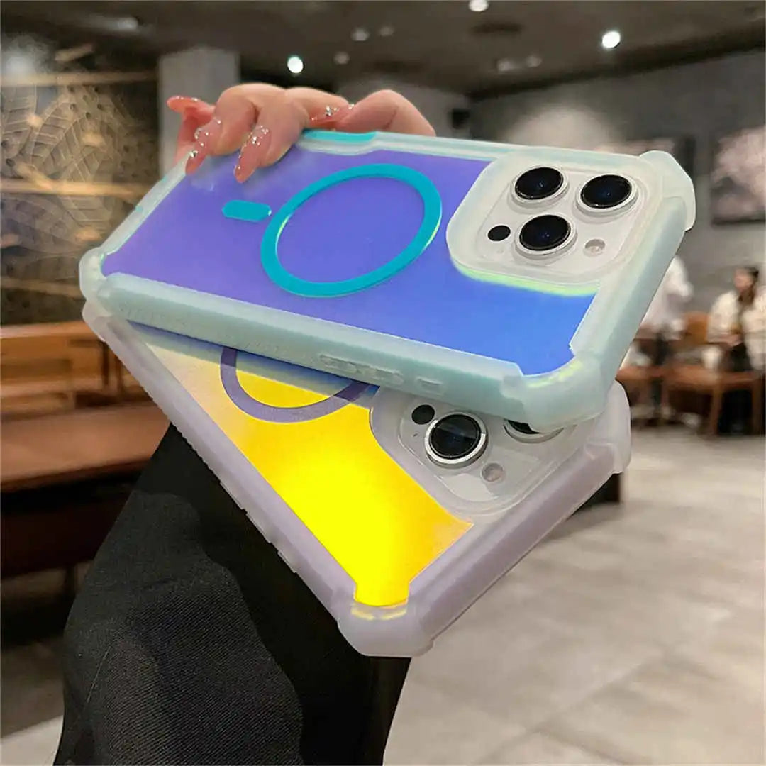 Person holding a phone with a colorful case in an indoor setting