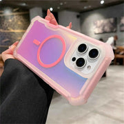 Phone case with gradient design held by a person in an indoor setting