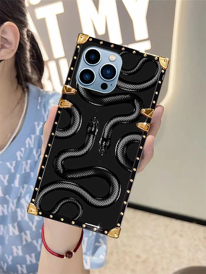 A girl is holding Black kingsnake square phone case