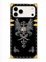 A black phone case with a gothic skull and crossed swords design, embellished with silver rhinestone-style details, featuring gold-tone metal corner protectors and rivets, shown on a white phone against a light gray background.