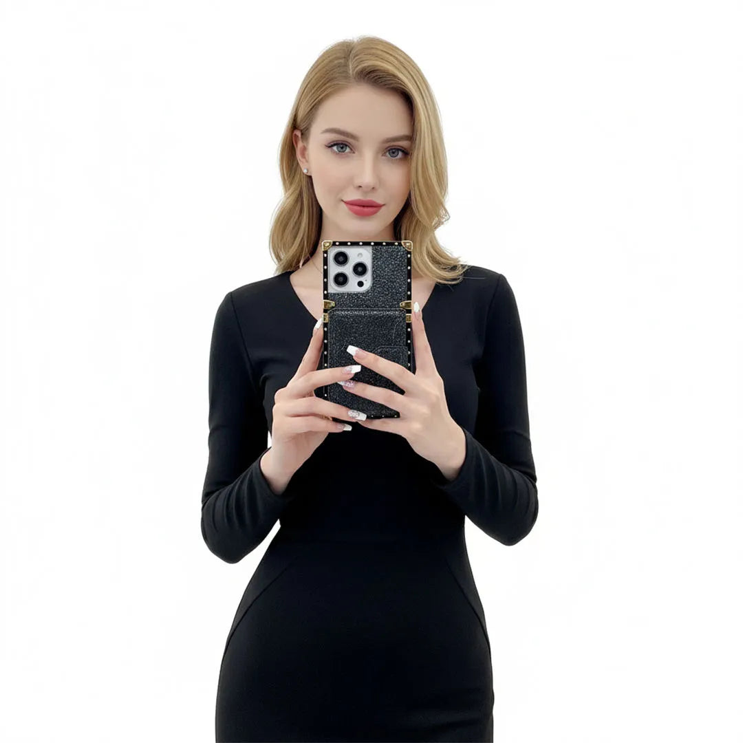 Woman holding a black phone case with a white background