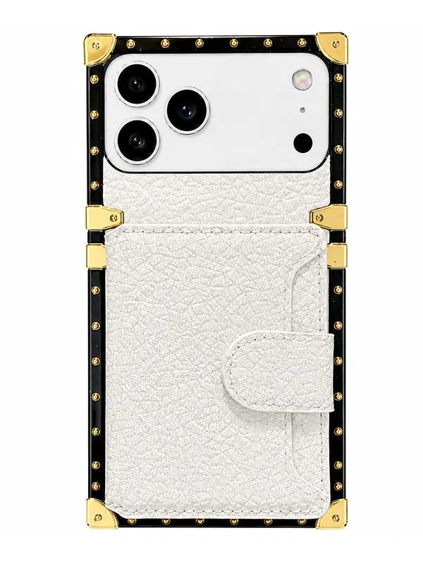 A white textured faux-leather phone case with a card pocket, featuring a black border with gold-tone metal studs and corner protectors, shown on a white background.