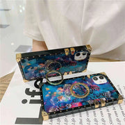 Colorful mandala phone case with decorative elements on a magazine