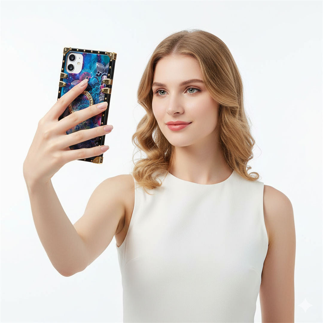 Woman holding a phone with a colorful case against a white background