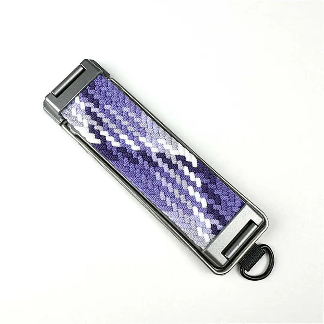 adhesive phone strap with purple and white pattern on a white background