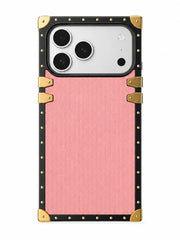 Square-trunk Phone case with pink back and gold accents on a white background