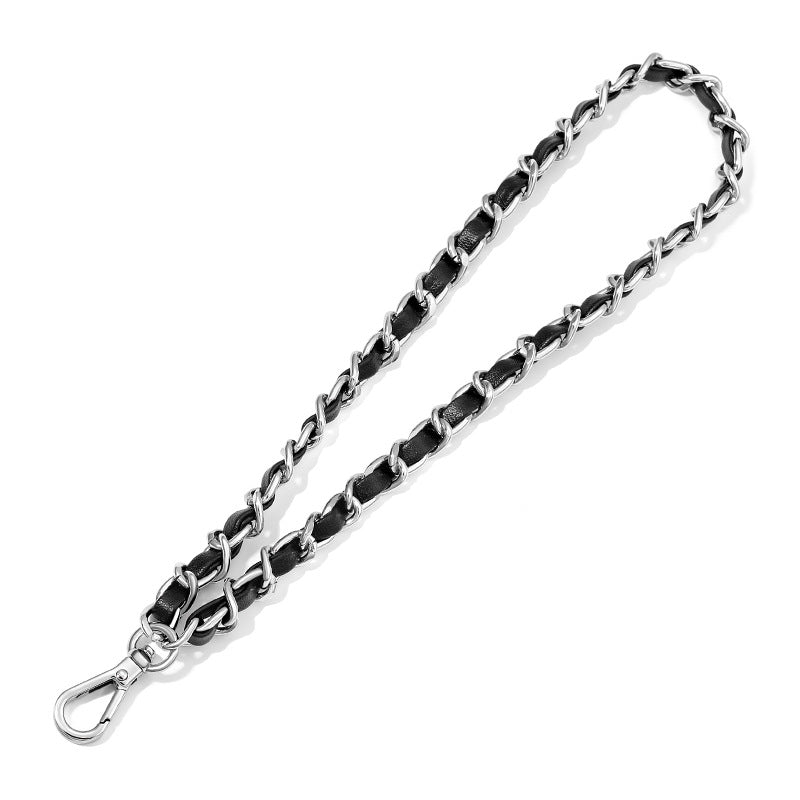 Silver chain with black stones on a white background