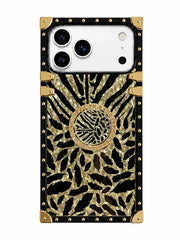 A protective phone case featuring a black and gold animal print pattern with a central circular medallion, a black border with gold studs, and gold metal corner protectors, shown on a white background.
